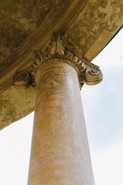Photo of a pillar supporting a curved roof