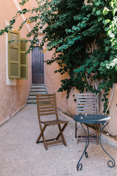 A table and chairs in a courtyard, Majorca